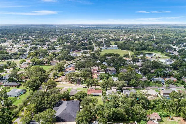 an aerial view of a city with lots of residential buildings