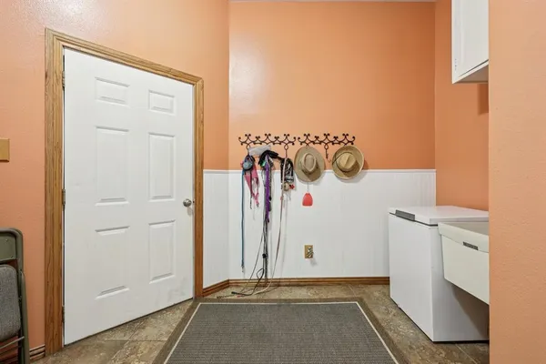 a bedroom with bed and window