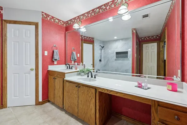 a view of a bathroom with a shower