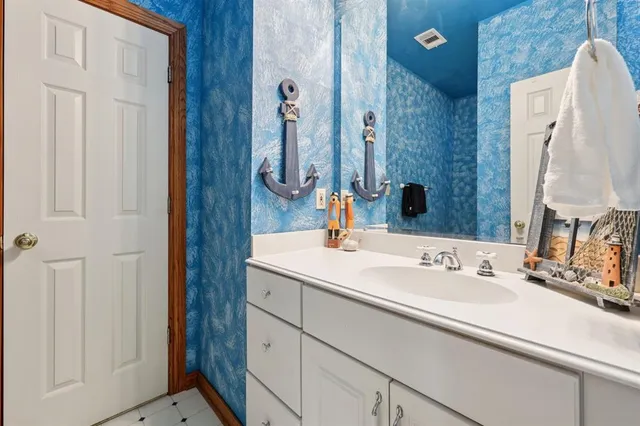 a bed room with a bed and a window