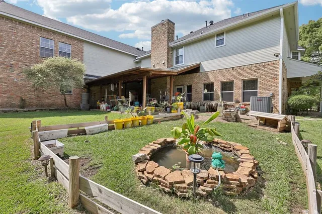 a view of a building with a yard