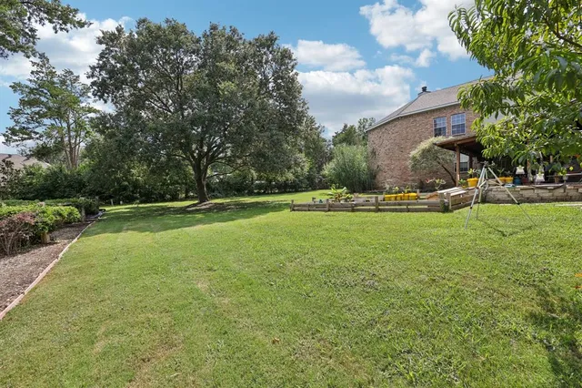 a view of a field with of trees