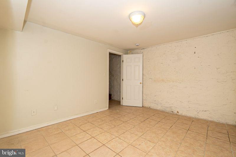 307 East 25th Street, Unit BASEMENT APARTMENT Baltimore, MD 21218 - Photo 7 of 21 a view of an empty room