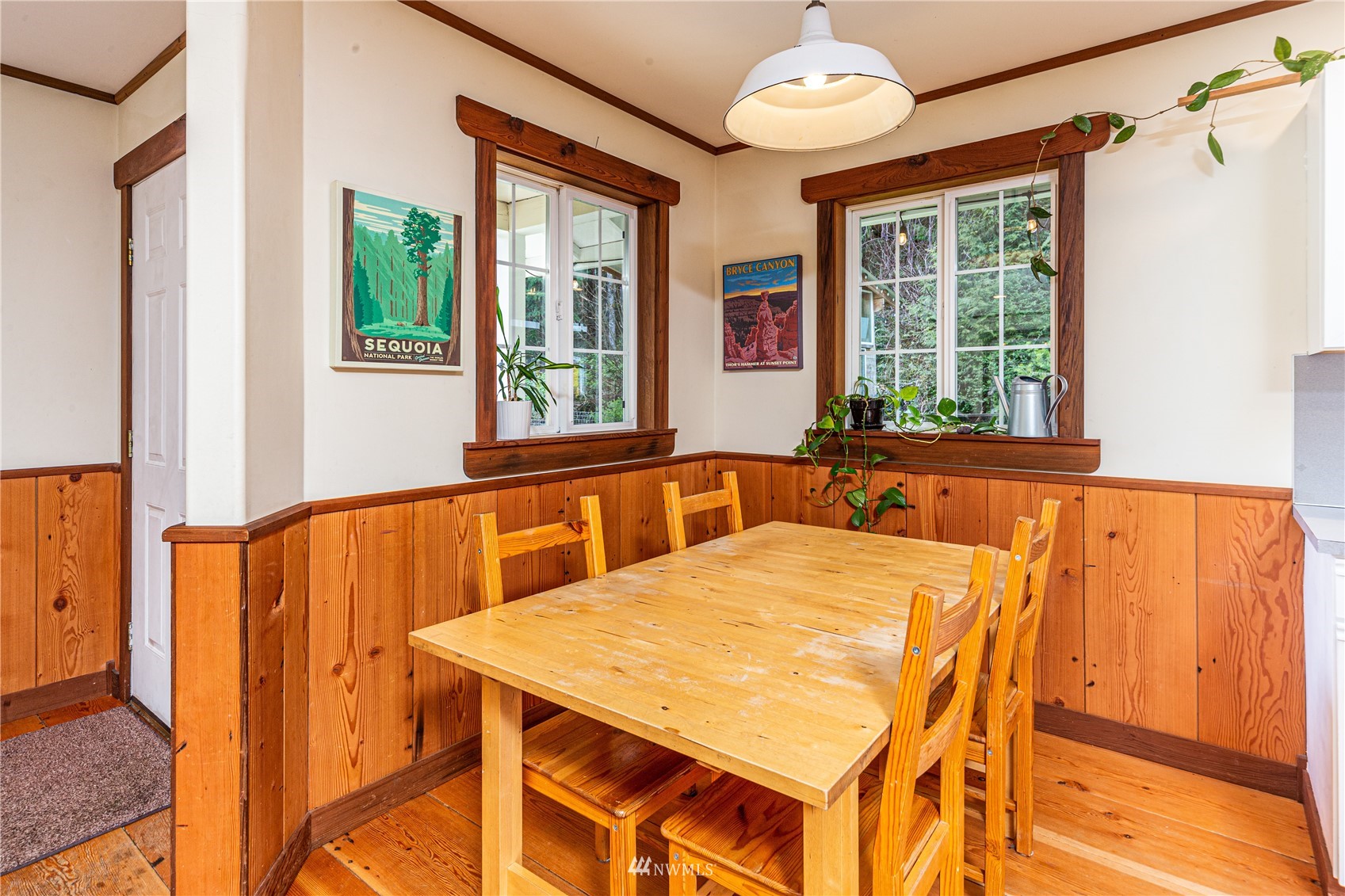 2310 West Valley Road Chimacum, WA 98325 - Photo 30 of 40 a dining room with a large window table and chairs
