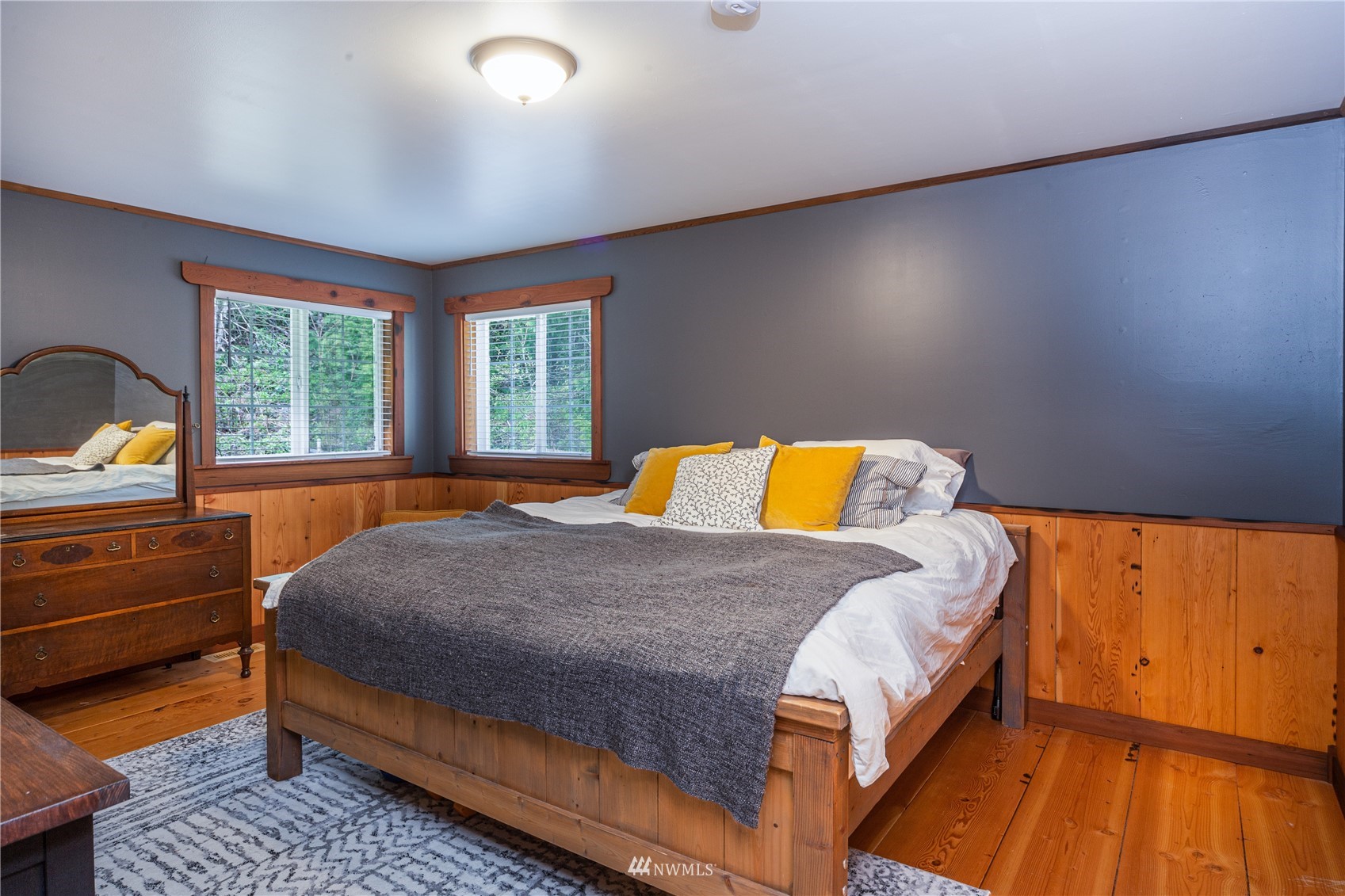 2310 West Valley Road Chimacum, WA 98325 - Photo 33 of 40 a bed sitting in a bedroom next to a window