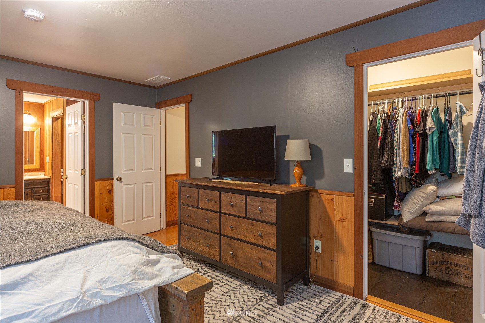 2310 West Valley Road Chimacum, WA 98325 - Photo 34 of 40 a bedroom with a bed and a television