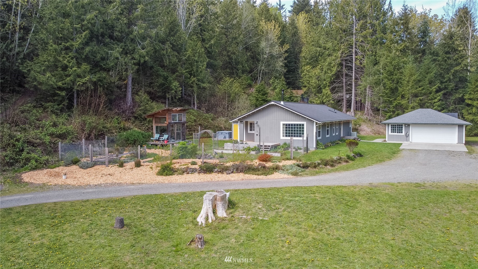 2310 West Valley Road Chimacum, WA 98325 - Photo 6 of 40 a front view of a house with a yard