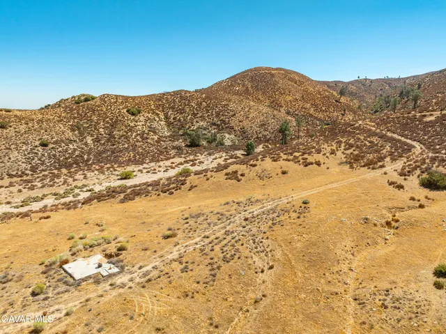 a view of mountain view with mountains in the background