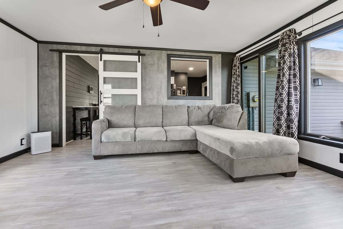 208 East 8th Street Gridley, IL 61744 - Photo 12 of 20 a living room with furniture and a large window