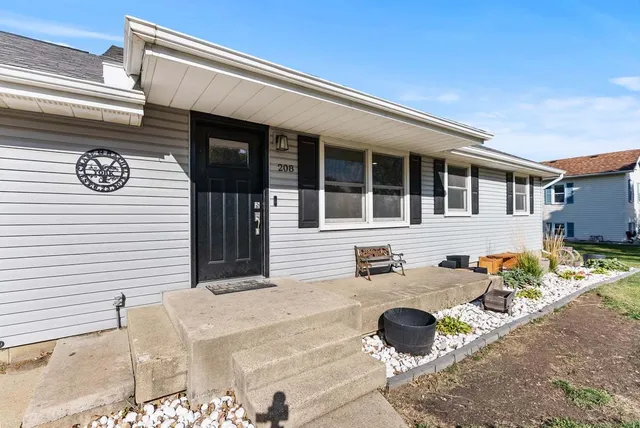 a front view of a house with patio
