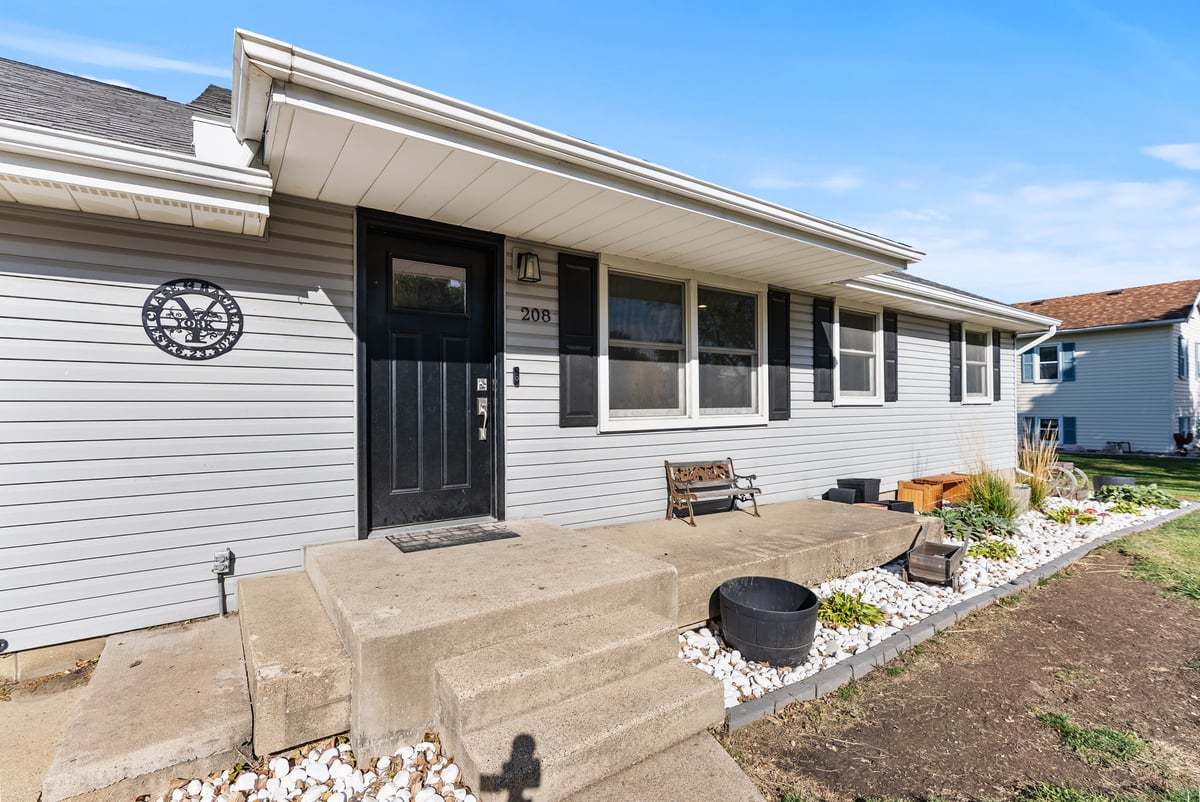 208 East 8th Street Gridley, IL 61744 - Photo 2 of 20 a front view of a house with patio