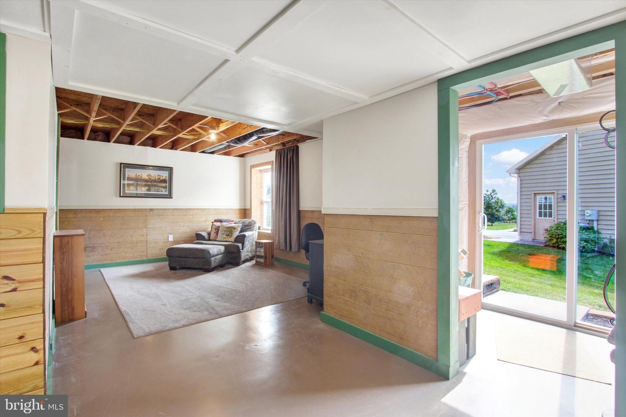 118 Fairplay Road Gettysburg, PA 17325 - Photo 30 of 43 a living room with furniture and a large window