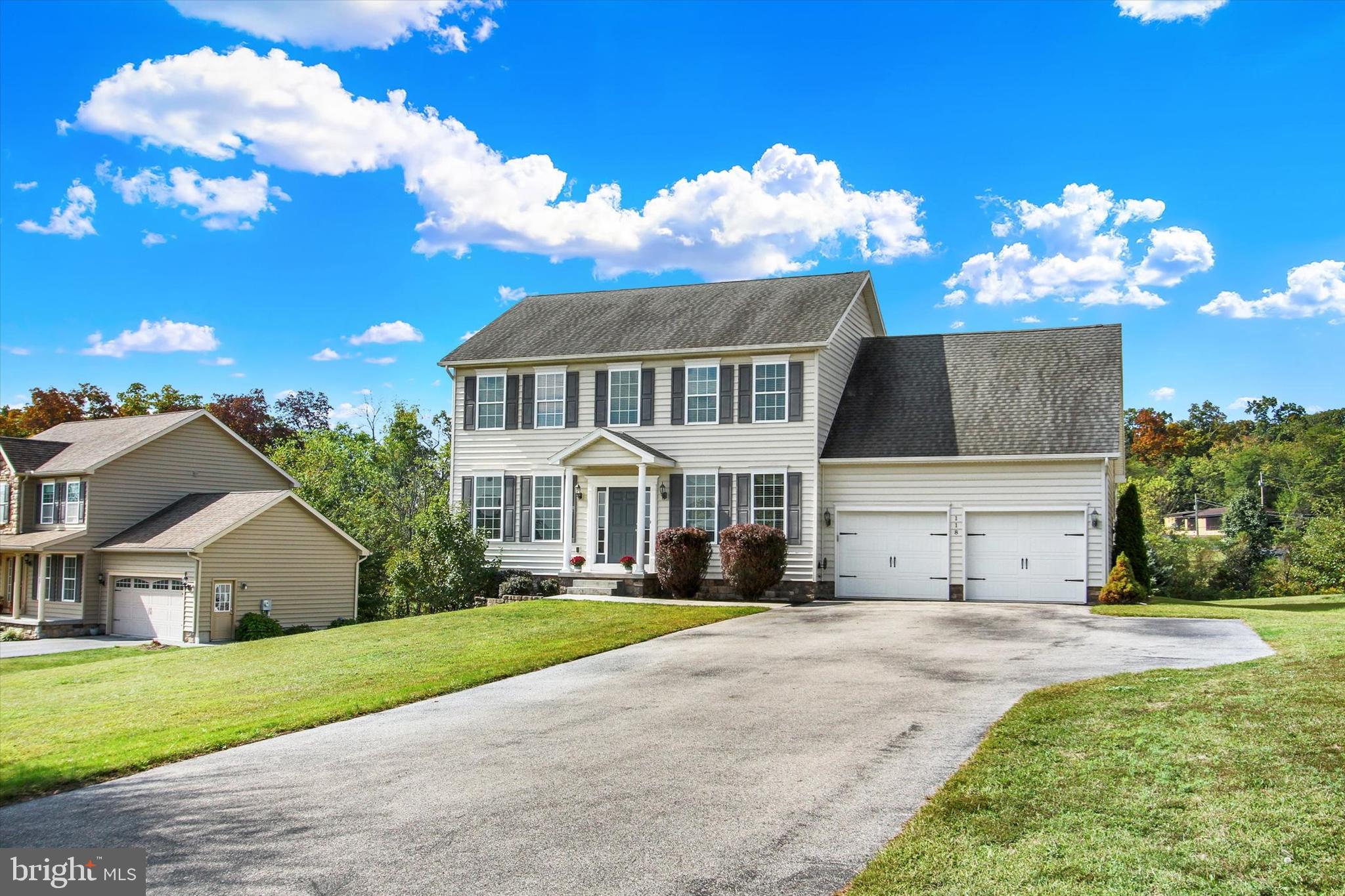 118 Fairplay Road Gettysburg, PA 17325 - Photo 43 of 43 a front view of a house with a yard and garage