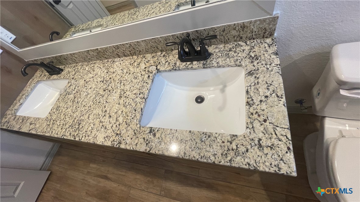 2408 Duntov Drive Temple, TX 76504 - Photo 20 of 41 a bathroom with a sink and mirror