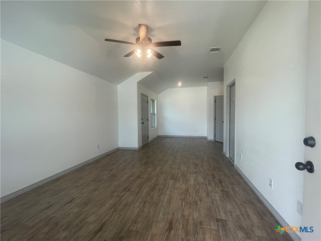 2408 Duntov Drive Temple, TX 76504 - Photo 3 of 41 wooden floor in an empty room with a window