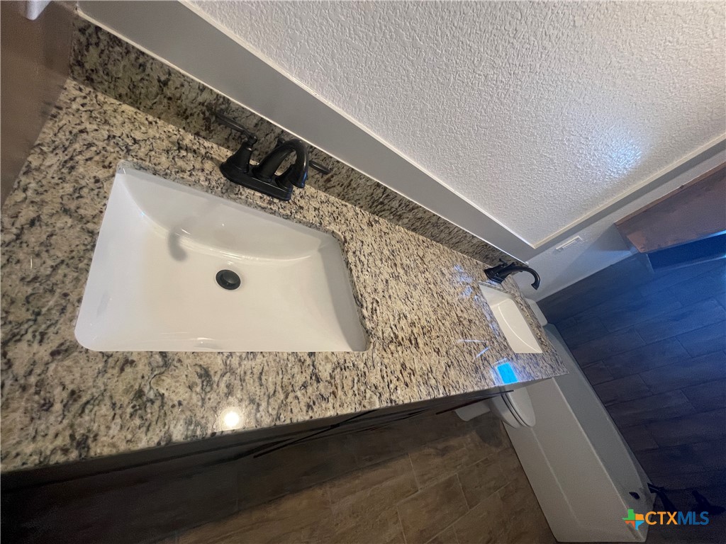 2408 Duntov Drive Temple, TX 76504 - Photo 35 of 41 a bathroom with a sink and mirror