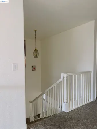 a room with a sink and a mirror