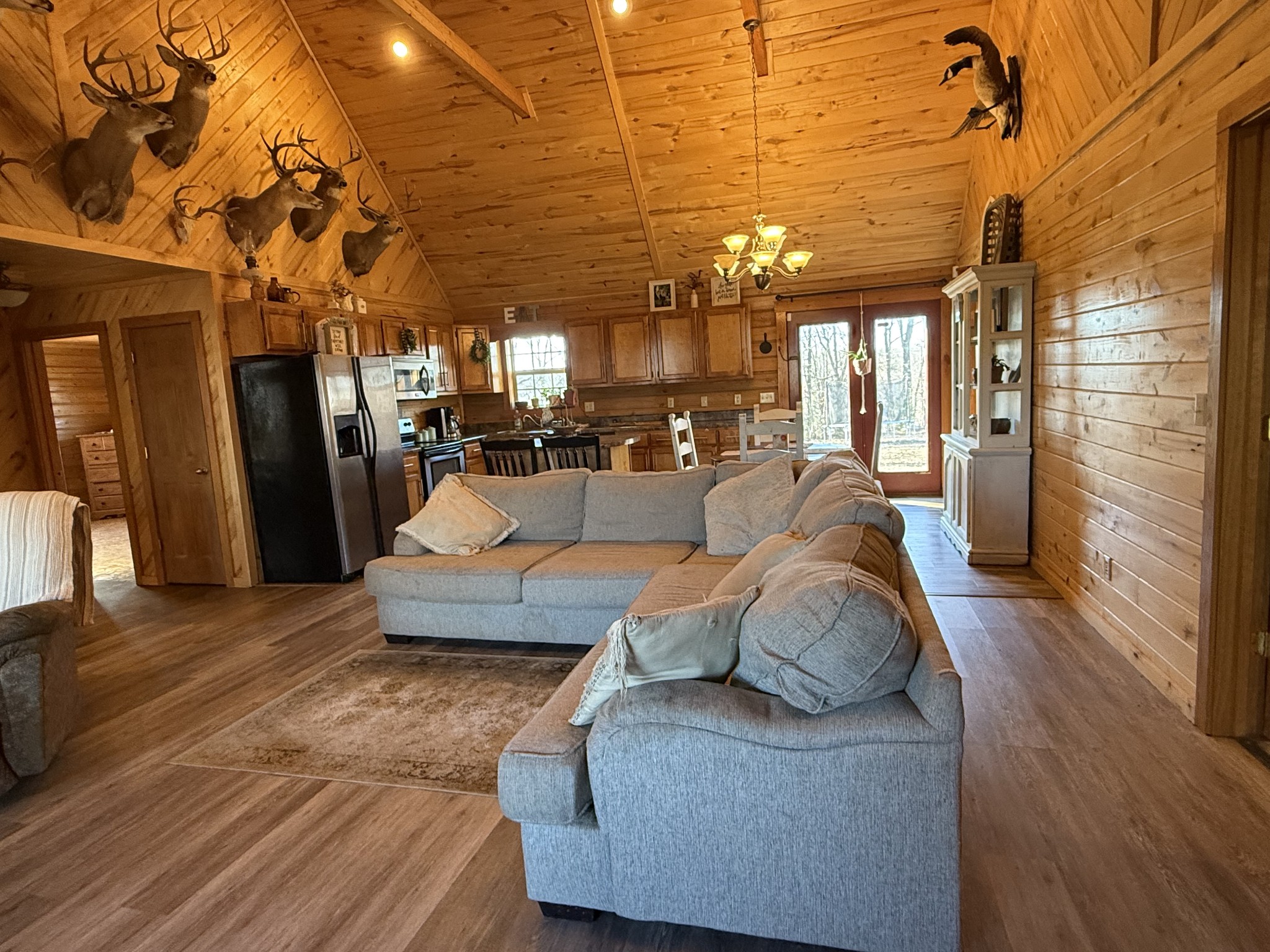 6843 Rabbit Creek Road Buchanan, TN 38222 - Photo 12 of 61 a living room with furniture and a chandelier