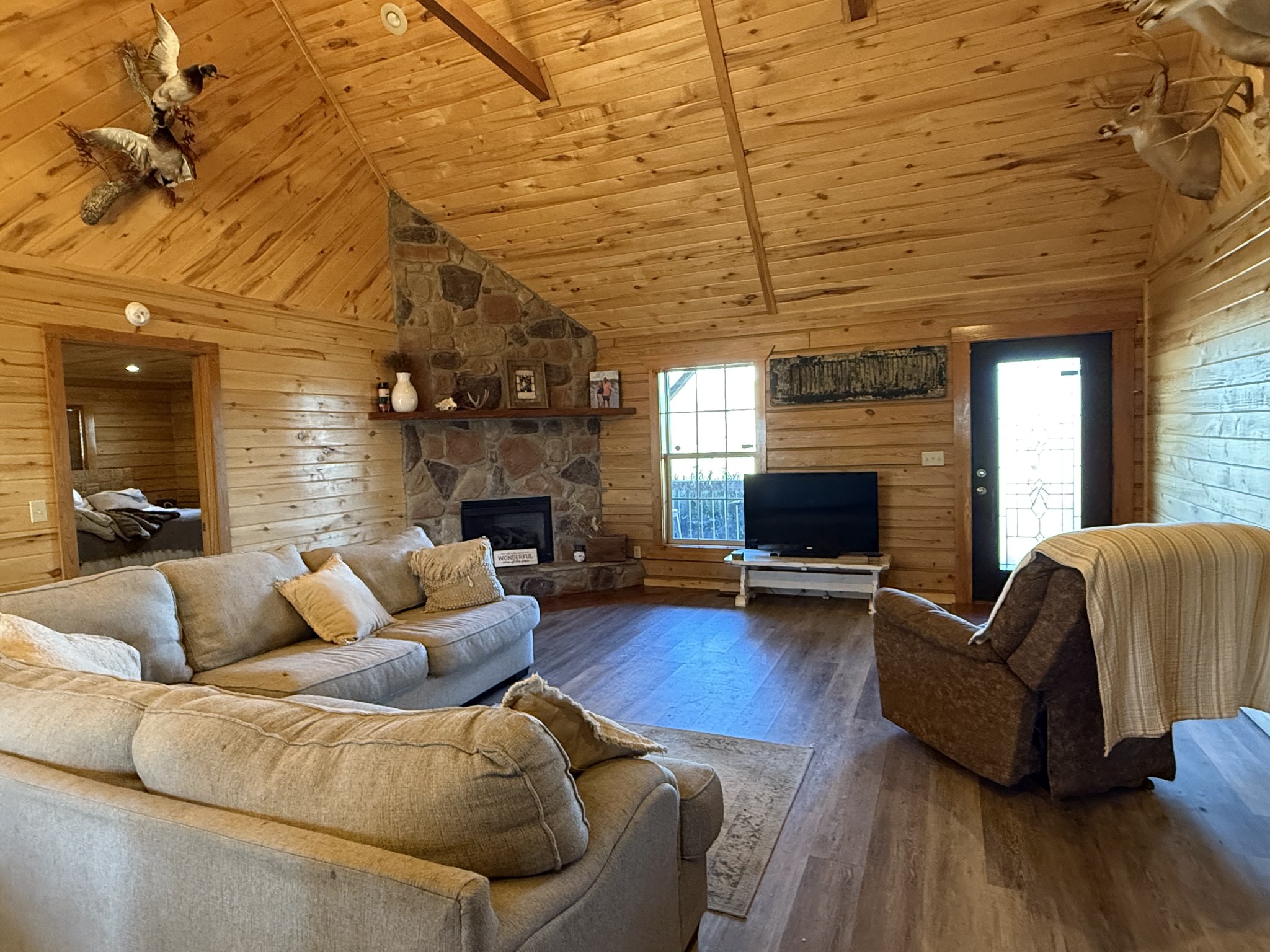 6843 Rabbit Creek Road Buchanan, TN 38222 - Photo 13 of 61 a living room with furniture and a fireplace
