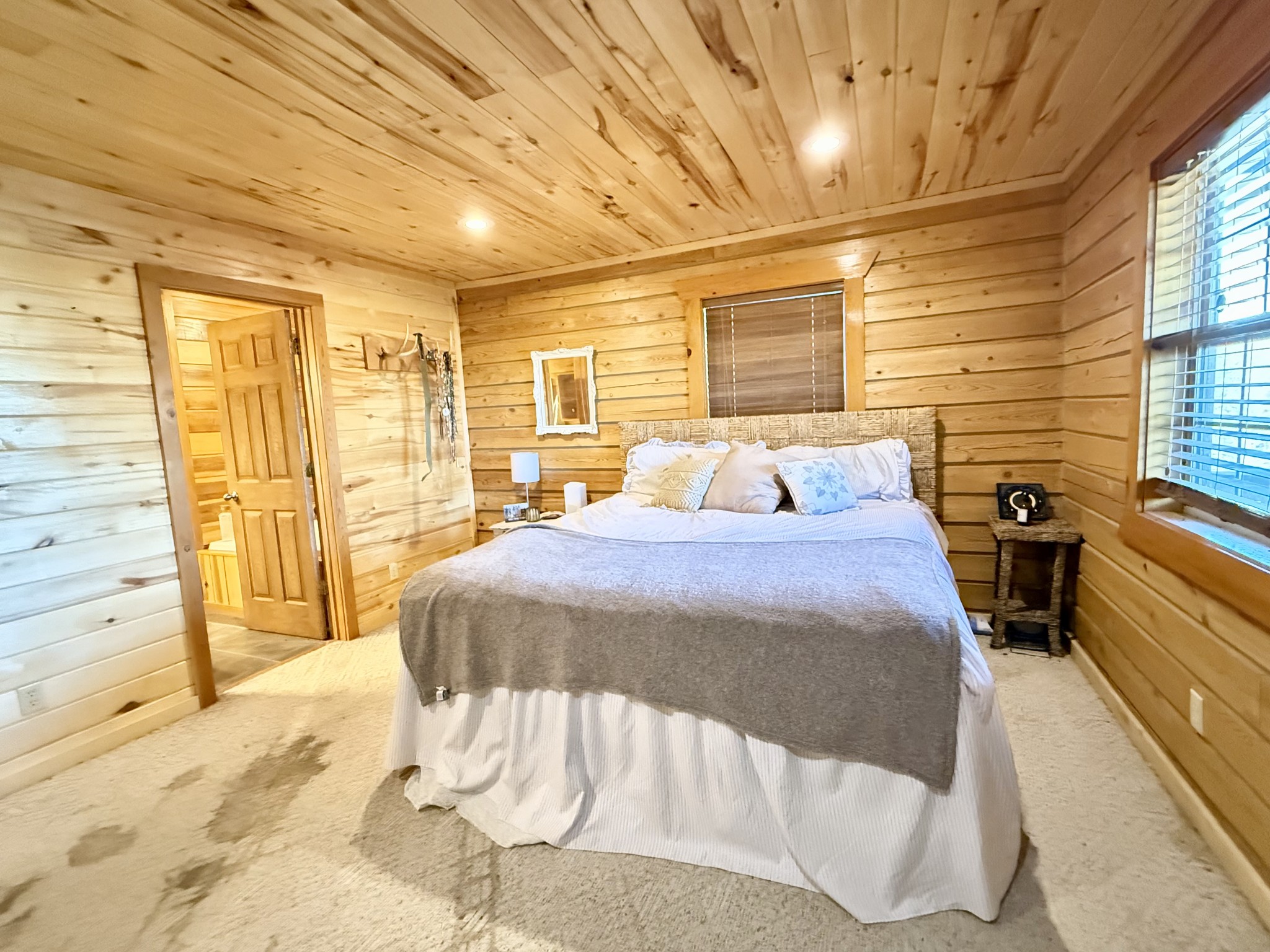 6843 Rabbit Creek Road Buchanan, TN 38222 - Photo 24 of 61 a bedroom with a bed and wooden floor