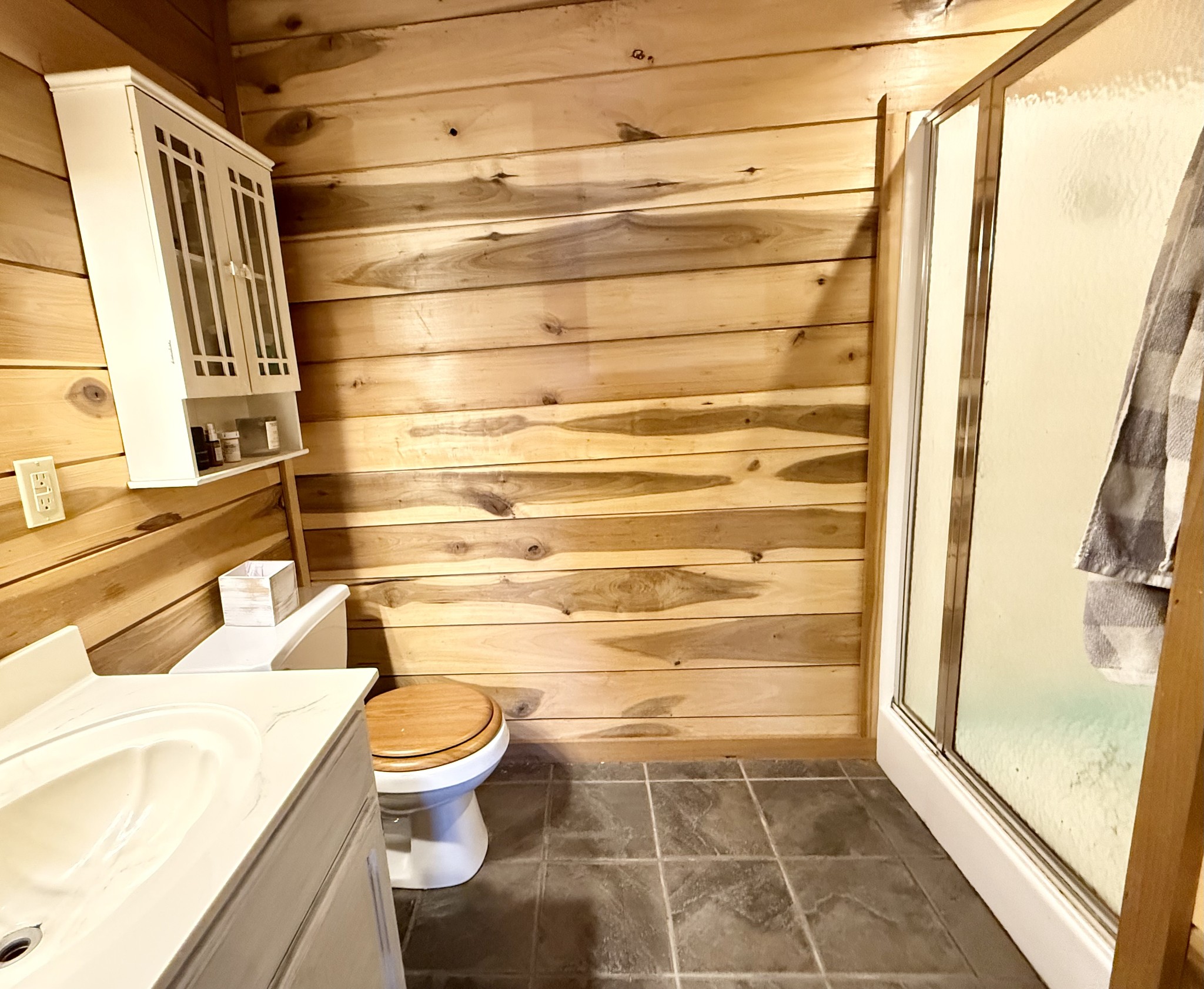 6843 Rabbit Creek Road Buchanan, TN 38222 - Photo 28 of 61 a bathroom with a toilet and a shower curtain