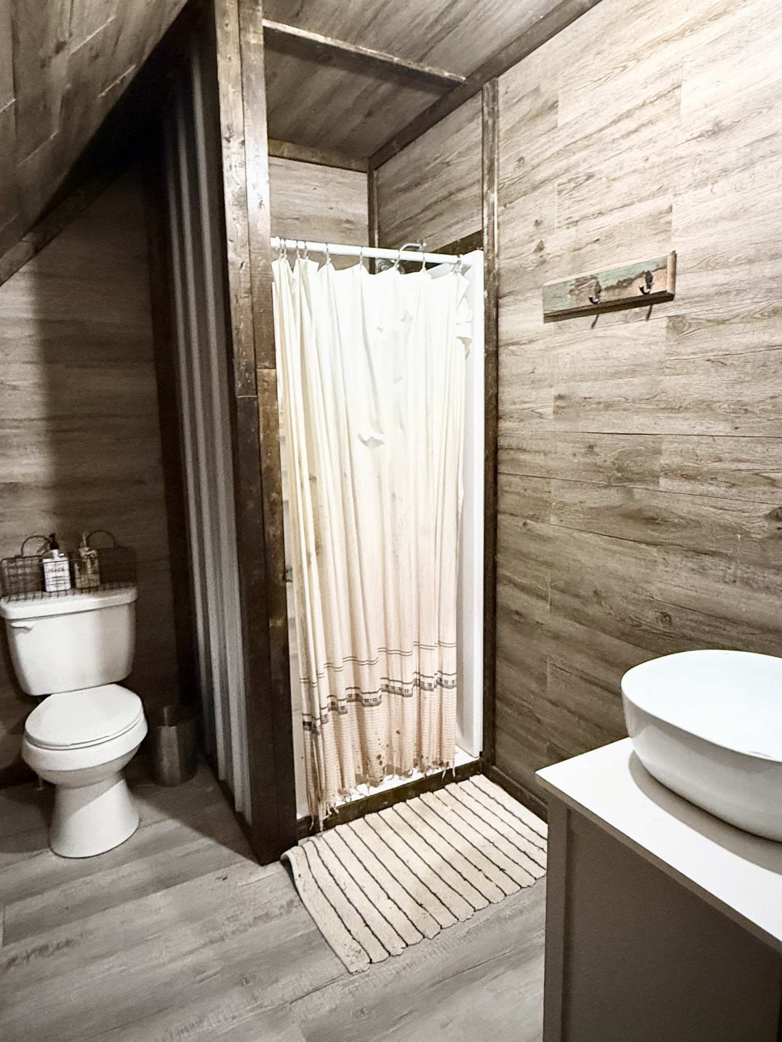 6843 Rabbit Creek Road Buchanan, TN 38222 - Photo 46 of 61 a bathroom with a sink a toilet and shower