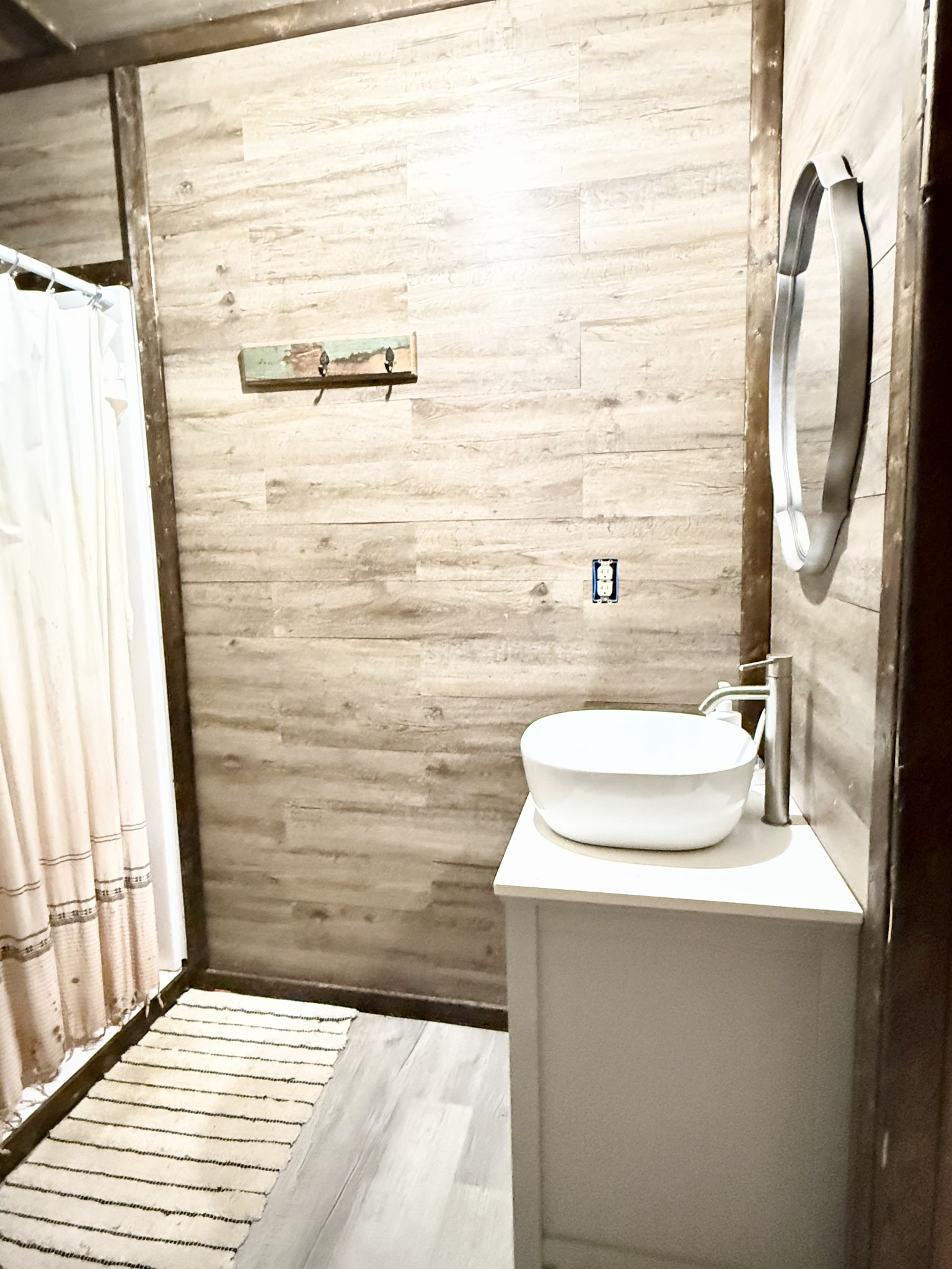 6843 Rabbit Creek Road Buchanan, TN 38222 - Photo 47 of 61 a bathroom with a sink and a mirror