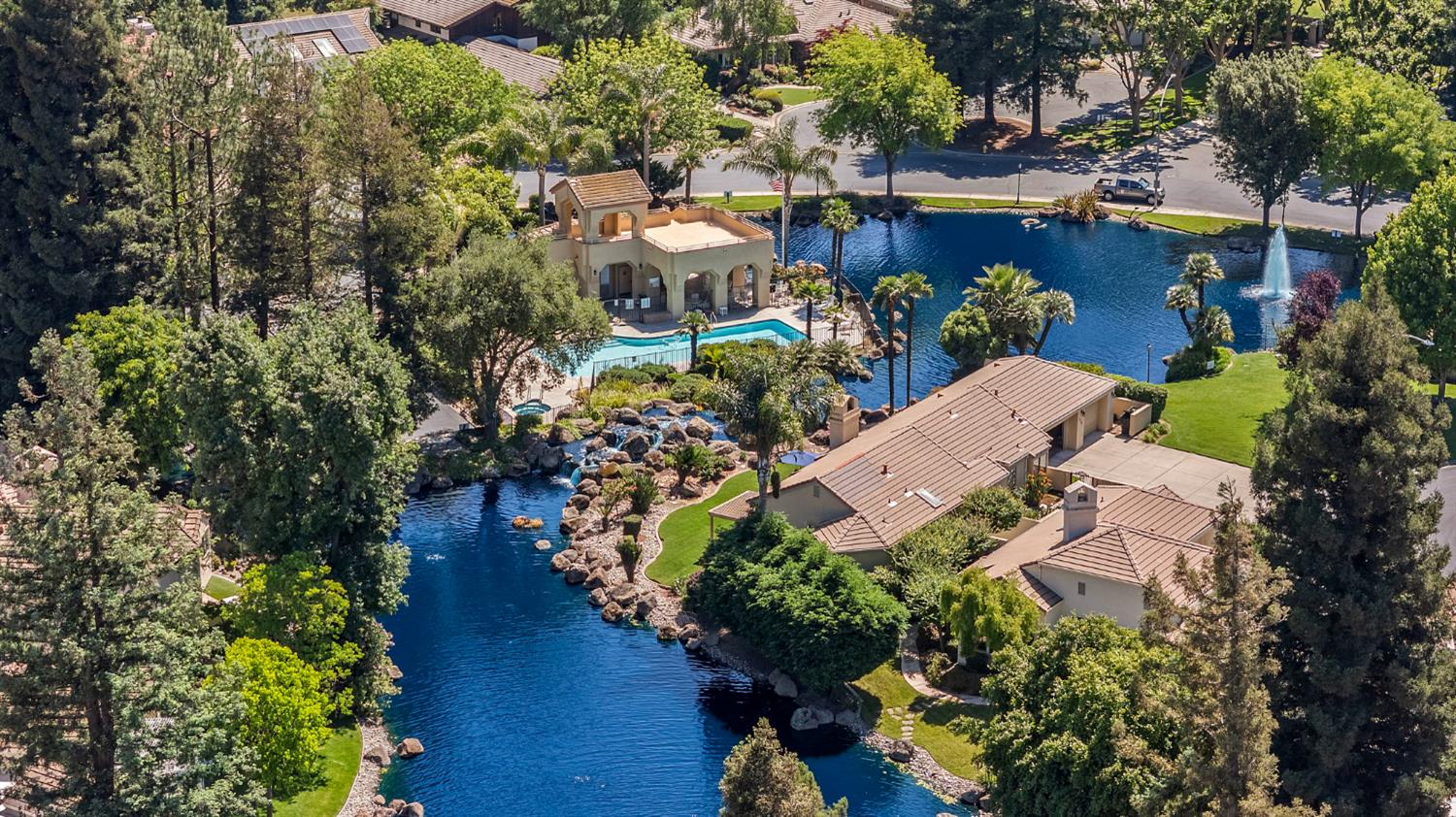 1013 Copper Lake Court Modesto, CA 95355 - Photo 64 of 66 an aerial view of a house with a yard swimming pool outdoor seating and yard