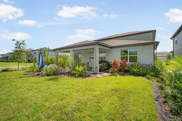 a view of a house with swimming pool