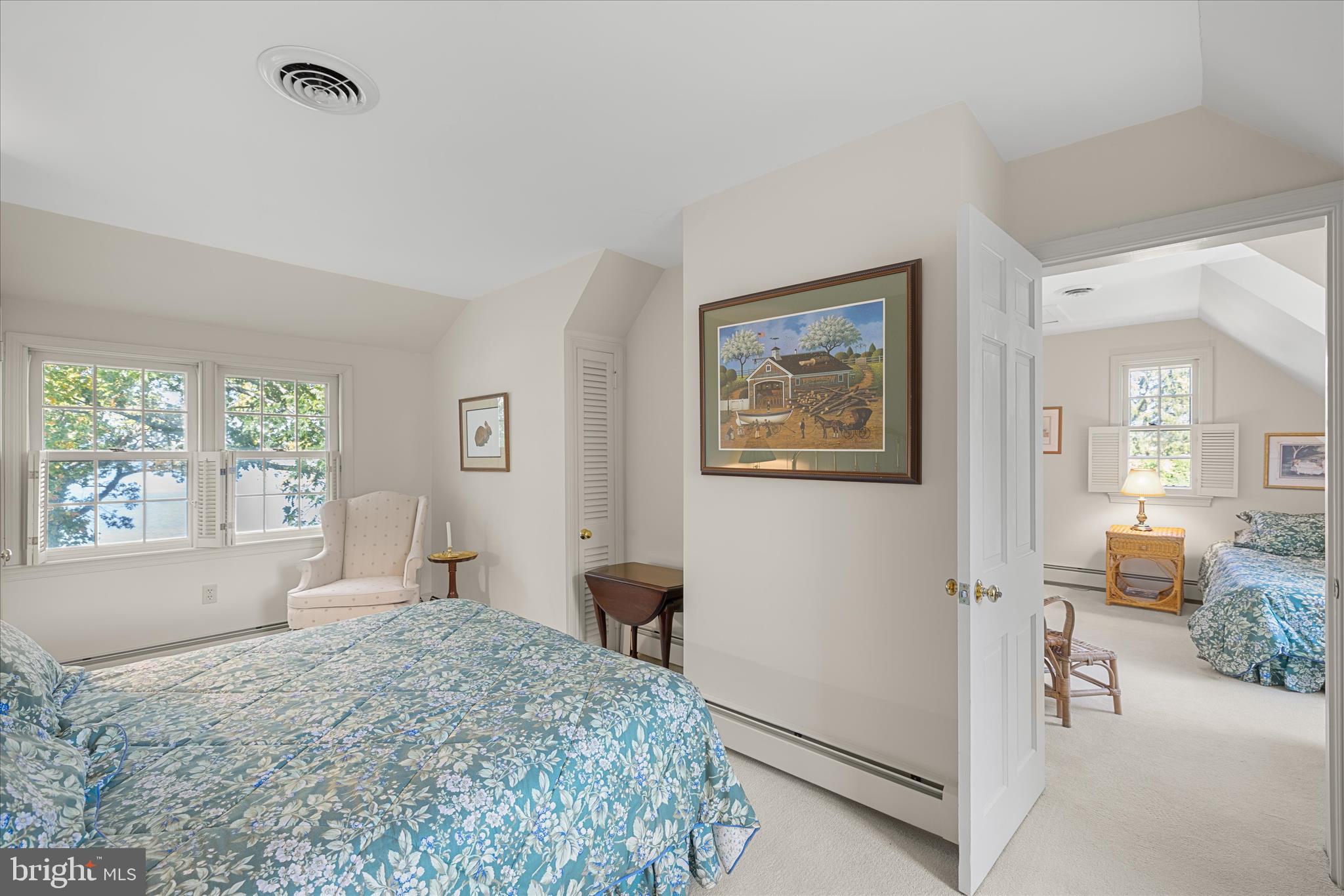 27473 Westpoint Road Easton, MD 21601 - Photo 29 of 58 a bedroom with a bed and a large window
