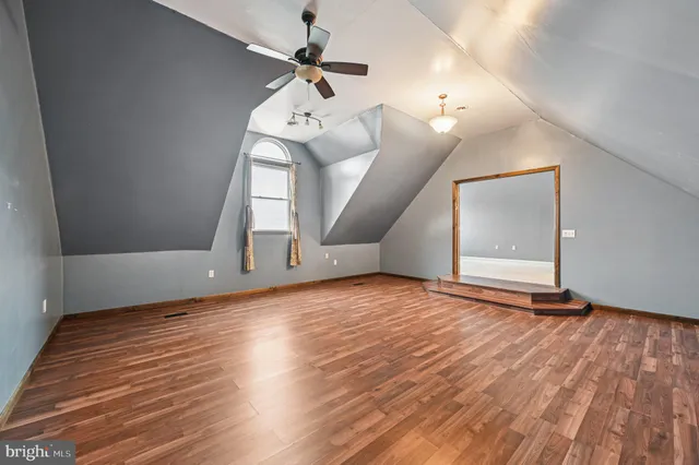 a picture of a bathroom with a shower