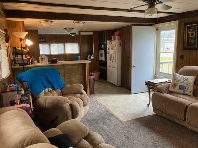 495 West 6th Street Braidwood, IL 60408 - Photo 3 of 7 a living room with furniture and a large window