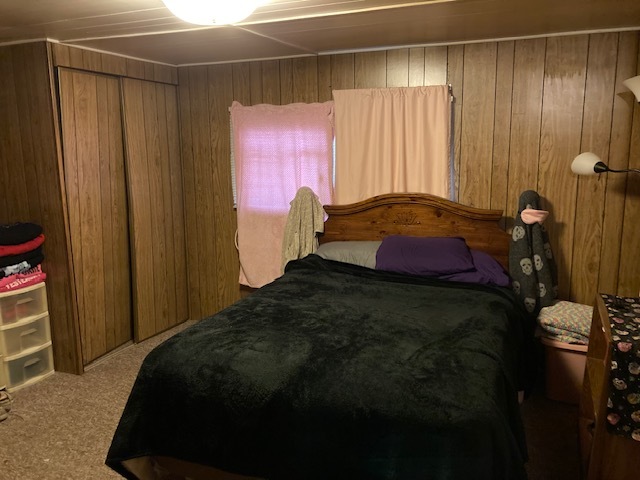 495 West 6th Street Braidwood, IL 60408 - Photo 5 of 7 a bedroom with a bed and a window