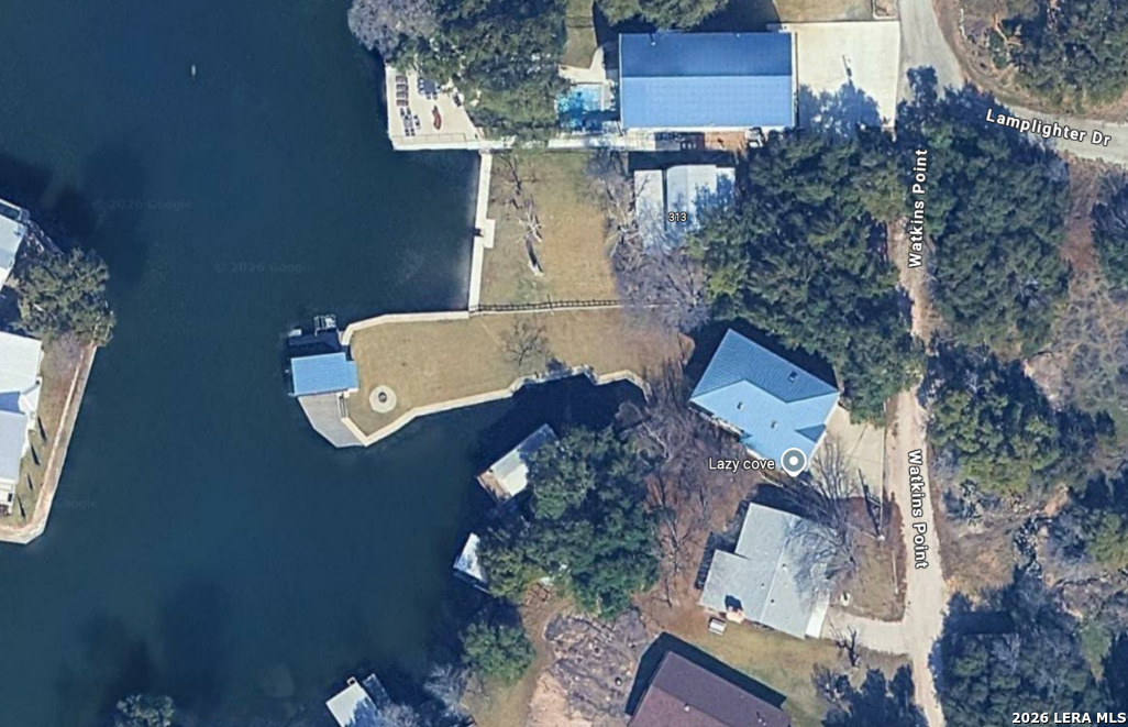 an aerial view of house with yard