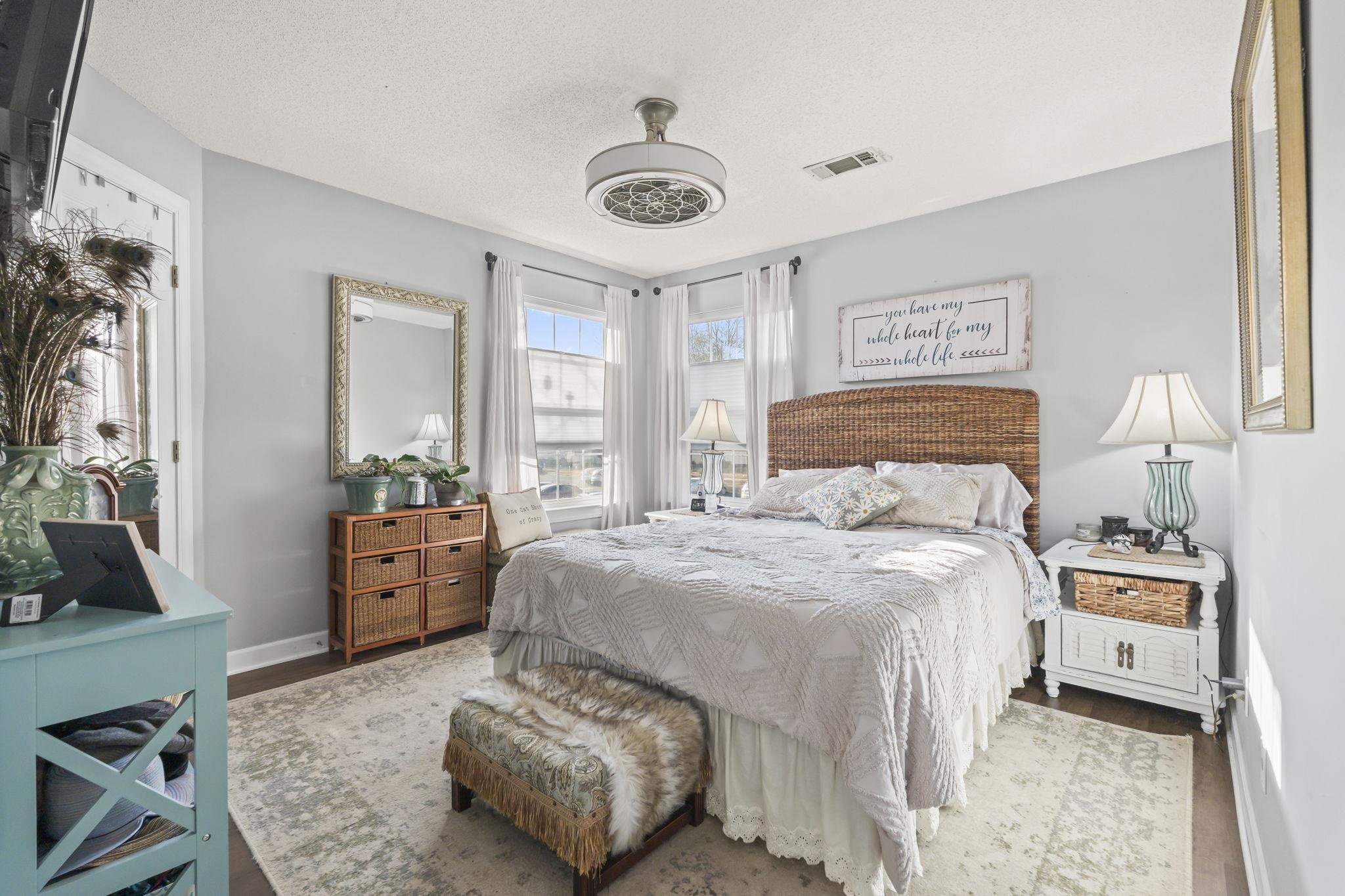 4383 Daphne Lane, Unit F Murrells Inlet, SC 29576 - Photo 20 of 35 Bedroom with a textured ceiling and wood finished floors