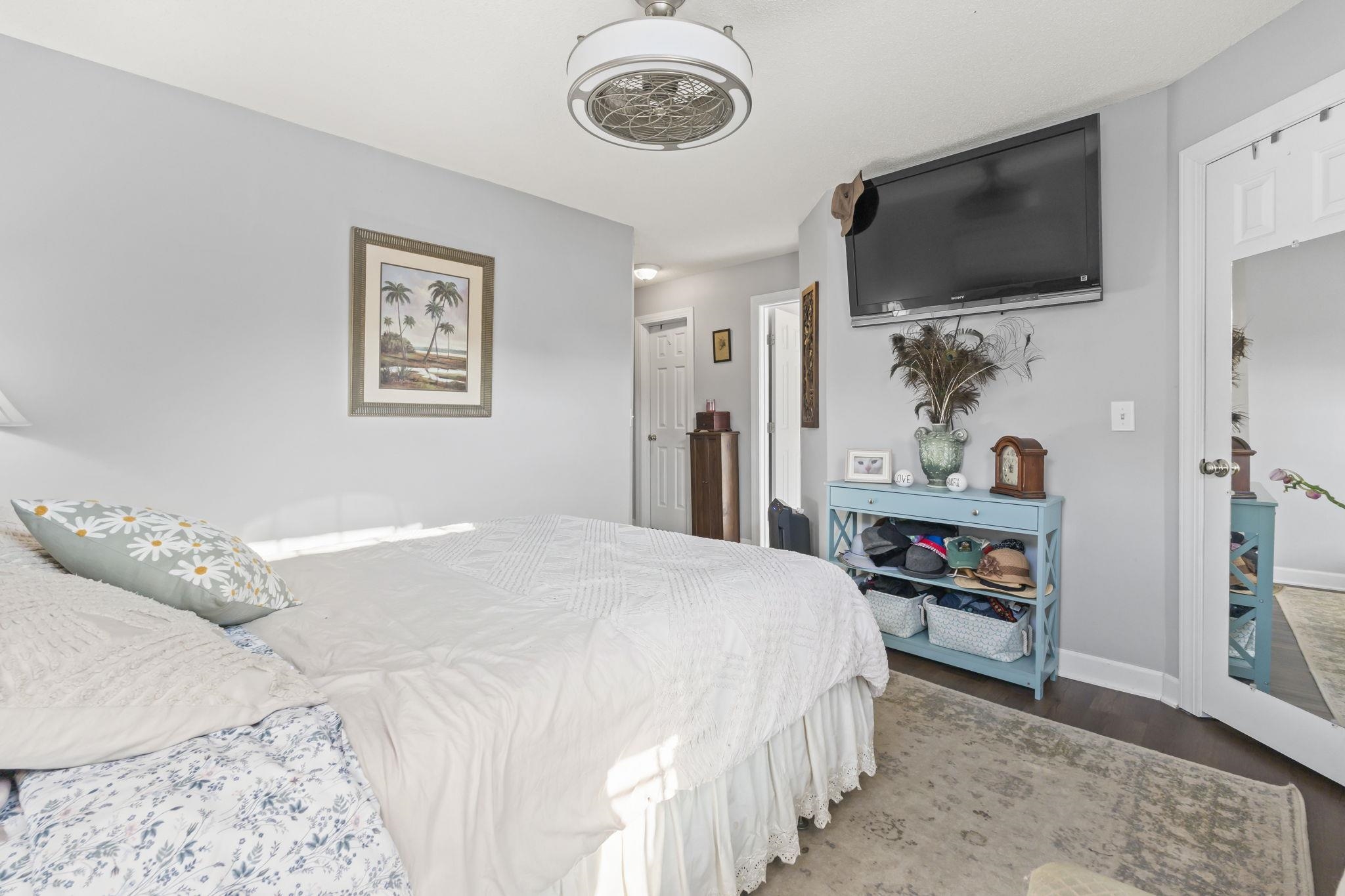4383 Daphne Lane, Unit F Murrells Inlet, SC 29576 - Photo 21 of 35 Bedroom featuring dark wood-type flooring and baseboards