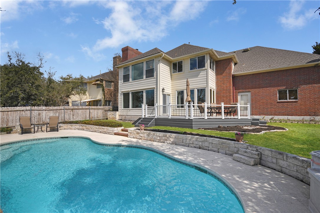a front view of house with yard and seating area