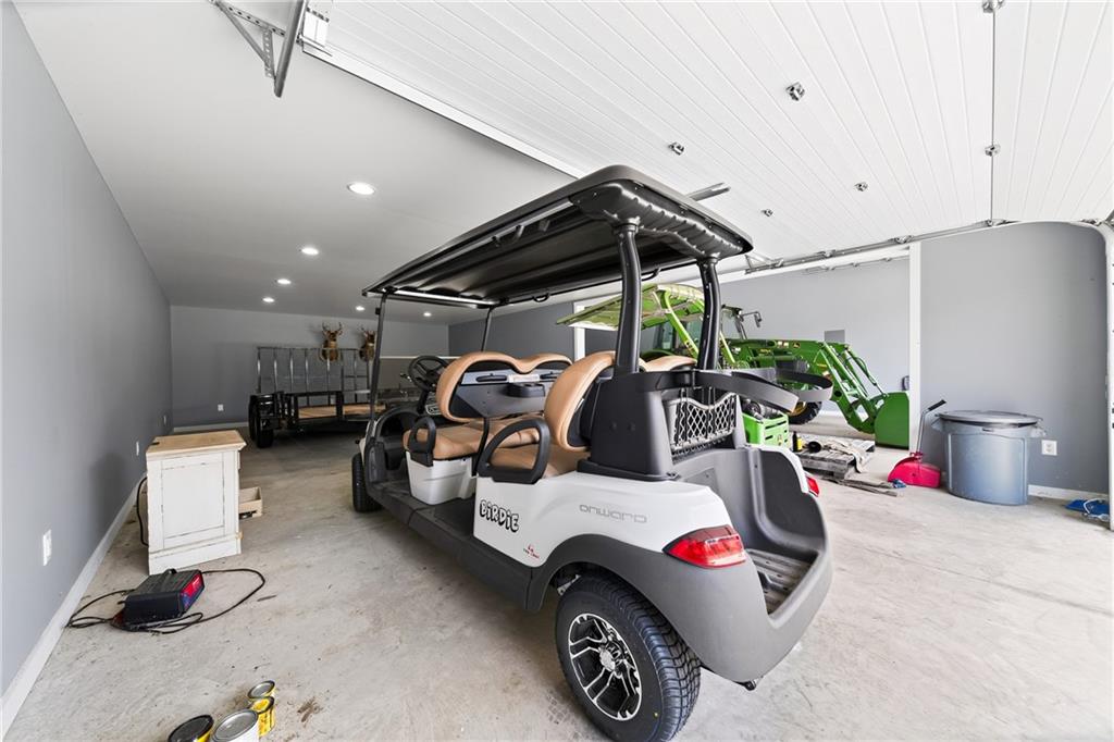 611 Padgetts Road Opelika, AL 36804 - Photo 44 of 64 Spacious garage with light gray walls, a concrete floor, and recessed lighting