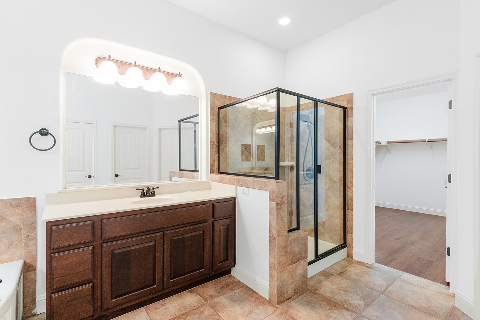 114 North Saddle Ridge Drive Cedar Park, TX 78613 - Photo 19 of 40 a spacious bathroom with a double vanity sink mirror and double