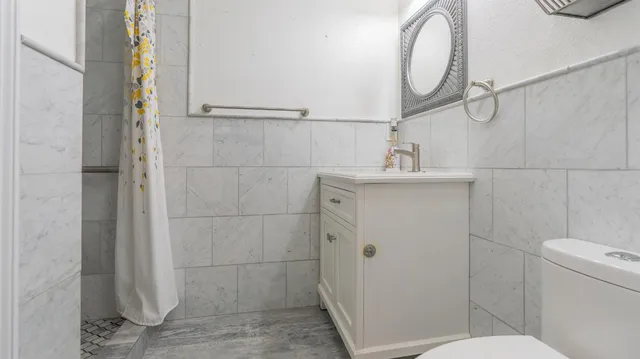 a view of a balcony with an ocean view