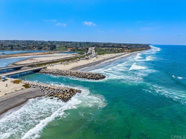 a view of a ocean with beach