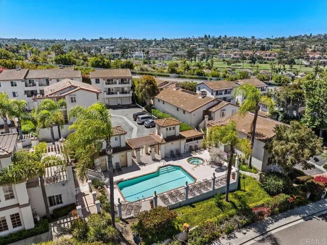an aerial view of a house with a garden