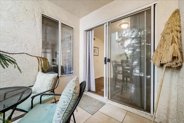 a bathroom with a shower and a mirror