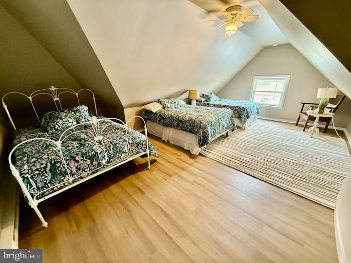 1 LaVallette Road Crisfield, MD 21817 - Photo 26 of 30 Charming attic retreat with cozy beds.