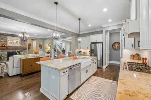 a spacious bathroom with a vanity and a mirror