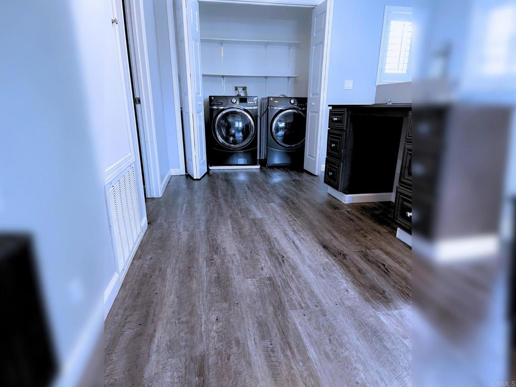 1379 Peach Avenue El Cajon, CA 92021 - Photo 18 of 22 a view of a storage & utility room with a washing machine