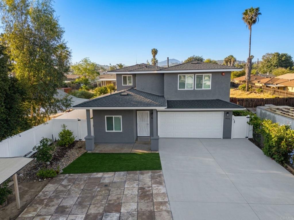 1379 Peach Avenue El Cajon, CA 92021 - Photo 2 of 22 a view of a house with a yard