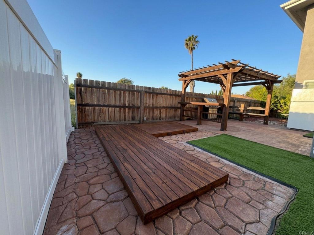 1379 Peach Avenue El Cajon, CA 92021 - Photo 4 of 22 a view of a backyard with sitting area