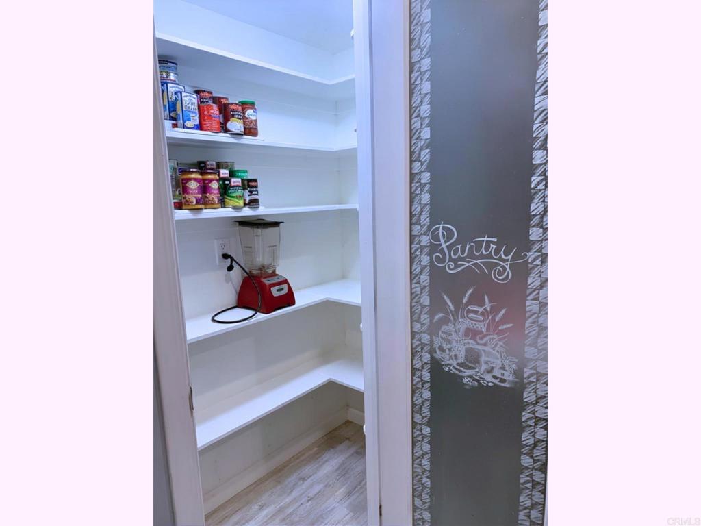 1379 Peach Avenue El Cajon, CA 92021 - Photo 10 of 22 a room with a book shelf