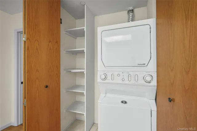 a utility room with washer and dryer